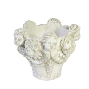 Ornate Baroque-style planter featuring sculpted cherub faces and classical old world European detailing around the rim. Side View