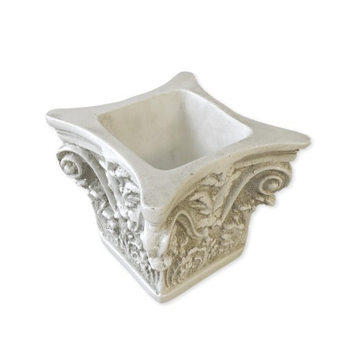 Ornate square planter with classical Baroque scrollwork, acanthus leaf motifs, and old world European architectural detailing. Side Angle