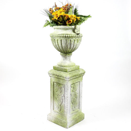 Ornate old world European urn planter with fluted bowl and classical pedestal base, featuring carved Baroque-style details. Side View
