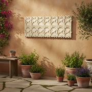 Ornate old world European garden border with classical scrollwork and symmetrical Baroque-inspired decorative patterns. Side Angle