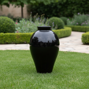 Tall, classical vase with a smooth, curved silhouette and narrow neck, reflecting old world European and Renaissance style elegance. Side Angle