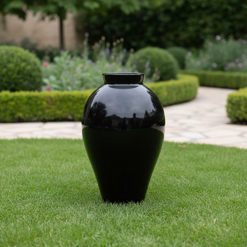 Tall, classical vase with a smooth, curved silhouette and narrow neck, reflecting old world European and Renaissance style elegance. Side Angle