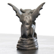 Gothic gargoyle statue with outstretched wings, crouching posture, and detailed, fierce facial features in medieval style. Different Angle