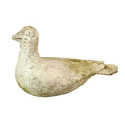 Stone dove sculpture with weathered surface, featuring old world European and classical design elements, simple and serene form.