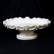 Ornate pedestal bowl with scalloped edge and classical Baroque detailing, featuring intricate scrollwork and old world European design. Different Angle