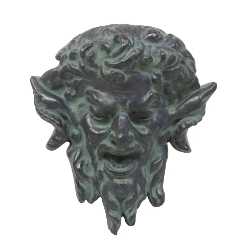 Grotesque satyr face with pointed ears and wild hair, featuring ornate old world European and classical Baroque detailing.