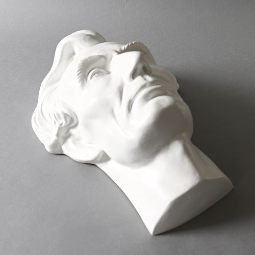 Classical bust sculpture with detailed facial features and stylized hair, inspired by Renaissance and old world European artistry Side Angle