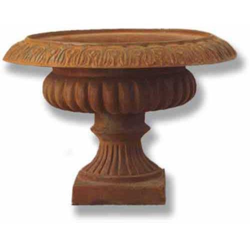 Ornate old world European urn planter with fluted pedestal base and classical leaf detailing around the rim.