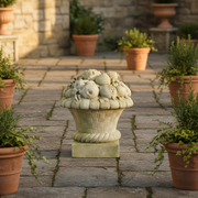 Ornate old world European basket overflowing with classical fruit motifs, featuring intricate woven and Baroque detailing. Side Angle