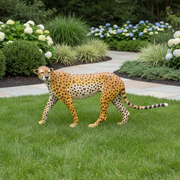 Cheetah figurine with detailed spots and lifelike posture, inspired by classical European naturalist art. Side Angle