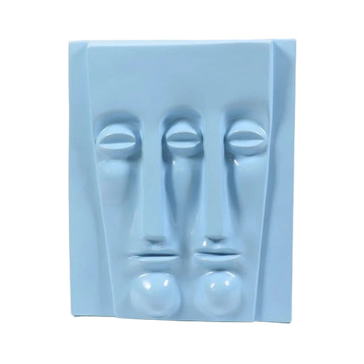 Abstract sculptural wall art featuring two elongated, stylized faces in a minimalist, classical European-inspired design. Side View
