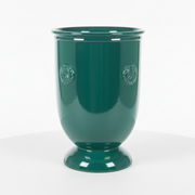 Ornate urn with classical old world European design, featuring embossed medallion details and a flared pedestal base.