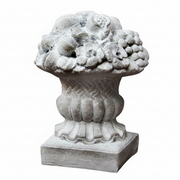 Ornate classical urn with intricate fruit and floral relief, featuring old world European and Baroque decorative detailing. Side View
