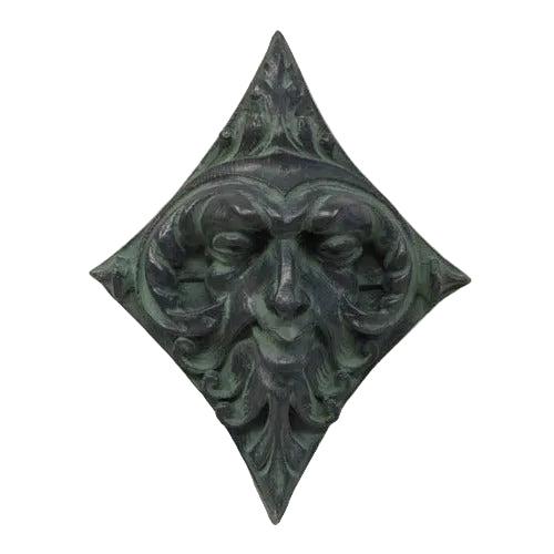 Green man face plaque with ornate, old world European design, featuring classical foliage motifs and a diamond-shaped Gothic frame.