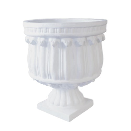 Ornate classical urn planter with fluted body, decorative relief details, and pedestal base in old world European style.