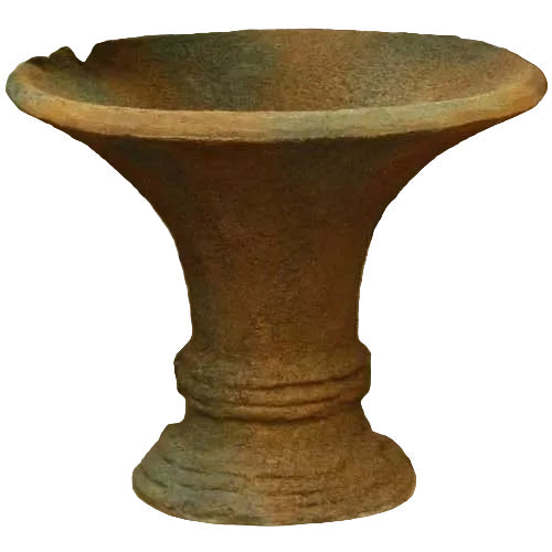 Ornate old world European pedestal basin with flared rim and classical carved base, evoking a Renaissance architectural style.