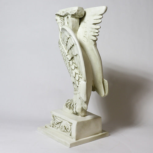 Winged griffin statue with ornate detailing, classical old world European style, featuring intricate Baroque and Renaissance motifs. Different Angle