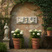 Baroque architectural relief panel featuring two cherubs with garlands and a central ornate urn in classical old world European style. Side Angle