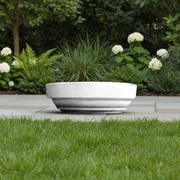 Classical Greek-style shallow bowl with clean lines and subtle, symmetrical ridges along the lower edge, evoking ancient simplicity. Side Angle