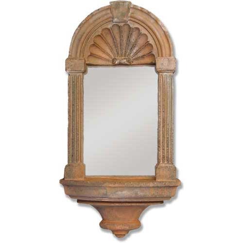 Arched wall mirror with ornate classical columns, shell motif, and old world European architectural detailing.