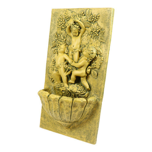 Baroque wall fountain with ornate relief of three cherubs playing among grapevines and leaves in classical old world European style Different Angle