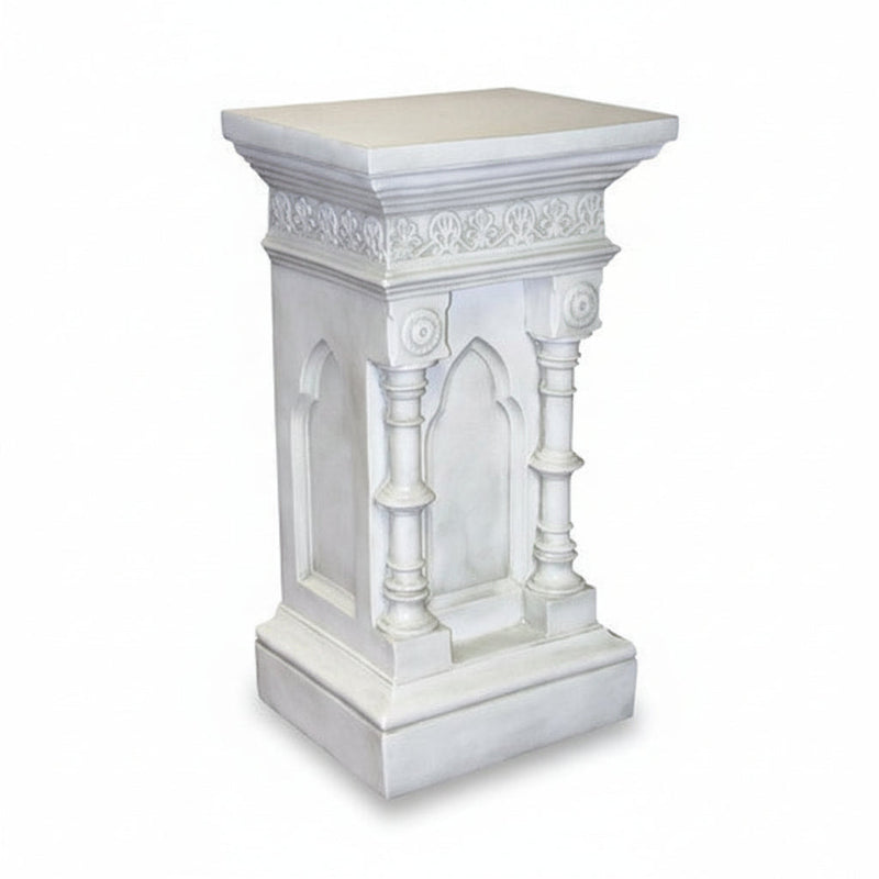 Ornate pedestal with classical Gothic arches, fluted columns, and intricate old world European detailing on the upper border.