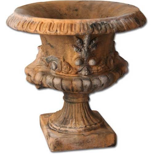 Ornate old world European urn with classical fluted pedestal, Baroque floral motifs, and scalloped rim detailing.