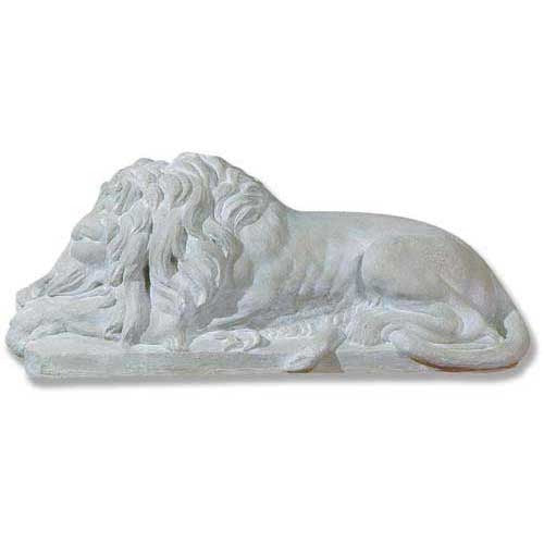 Lying lion statue with flowing mane, classical old world European style, detailed and ornate sculptural design.