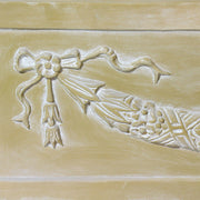 Rectangular planter box with ornate Baroque-style garland and ribbon relief, featuring classical old world European detailing. Side Angle