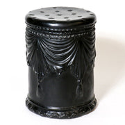 Ornate cylindrical stool with classical draped swag detailing and tassels, inspired by old world European and Baroque design elements. Side View