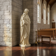 Madonna and Child statue in classical Renaissance style with ornate drapery and serene facial expressions. Side Angle