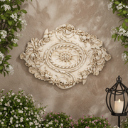 Ornate Baroque ceiling medallion with intricate floral scrollwork and classical old world European detailing. Side Angle