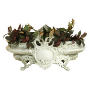 Ornate Baroque planter with intricate scrollwork, floral motifs, and classical old world European detailing on curved legs. Different Angle
