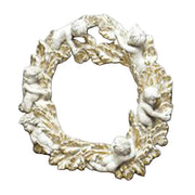 Ornate Baroque-style wreath adorned with classical cherubs and intricate leaf detailing in an old world European design.