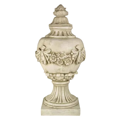Ornate classical urn with Baroque floral garland, fluted pedestal base, and old world European decorative detailing.