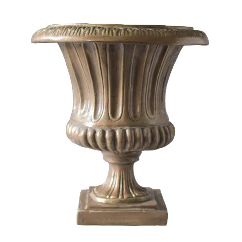 Classical urn with fluted body, ornate rim, and pedestal base in old world European style. Side View