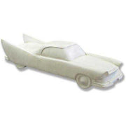 Classic car sculpture with pronounced tailfins, streamlined silhouette, and subtle old world European retro styling.