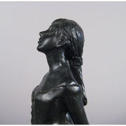 Ballet dancer figurine in classical pose with an ornate, old world European style and Renaissance-inspired detailing. Different Angle