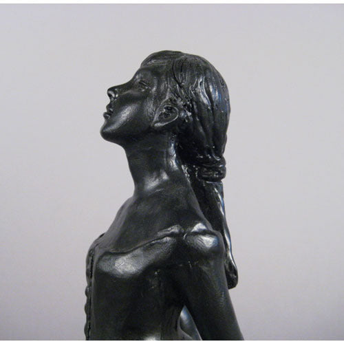Ballet dancer figurine in classical pose with an ornate, old world European style and Renaissance-inspired detailing. Different Angle