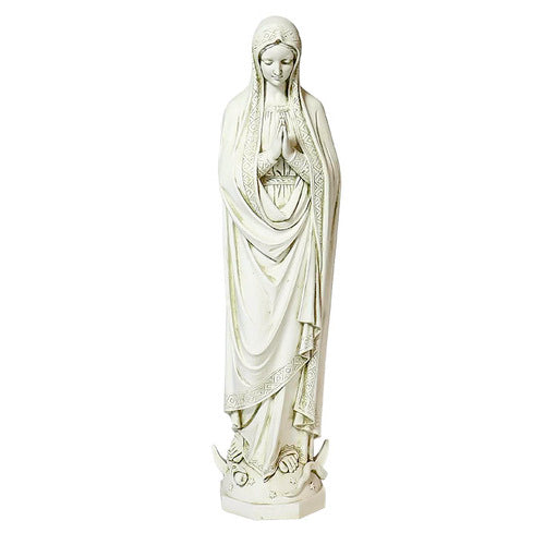 Virgin Mary statue in classical old world European style with ornate detailing, hands in prayer, and flowing draped robes. Side View