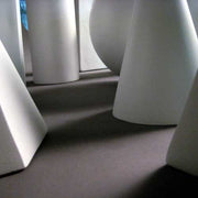 Geometric forms arranged in a group, featuring spheres, cubes, cones, pyramids, and cylinders in a classical study composition. Different Angle