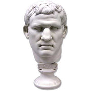 Classical Greco-Roman style male bust with strong features and short wavy hair on an ornate pedestal base. Side View