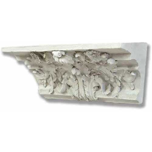 Ornate classical corbel with intricate Baroque floral and acanthus leaf carvings in old world European architectural style.