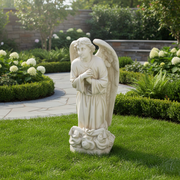 Kneeling angel statue with folded hands, detailed wings, and flowing robes in ornate old world European classical style. Side Angle