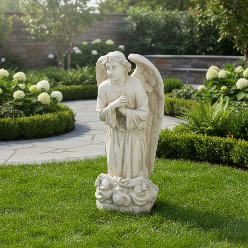 Kneeling angel statue with folded hands, detailed wings, and flowing robes in ornate old world European classical style. Side Angle
