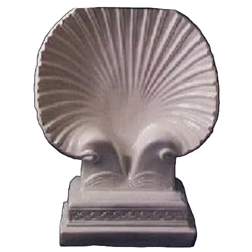 Shell-shaped classical pedestal with ornate base, featuring old world European and Renaissance-inspired sculptural details.
