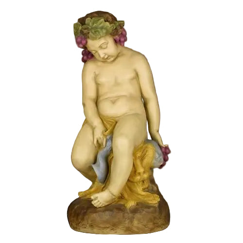 Cherub statue in classical Renaissance style, seated on a rock with grapevine wreath and draped cloth, featuring ornate detailing.