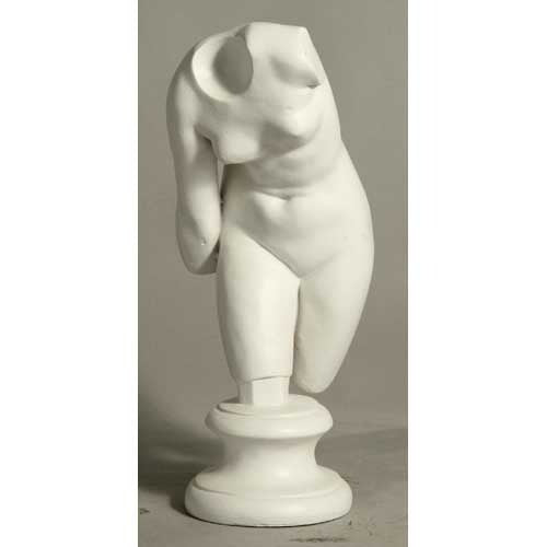 Classical Greek-style female torso sculpture with missing head and arms, displayed on a round pedestal, featuring smooth, ornate contours.
