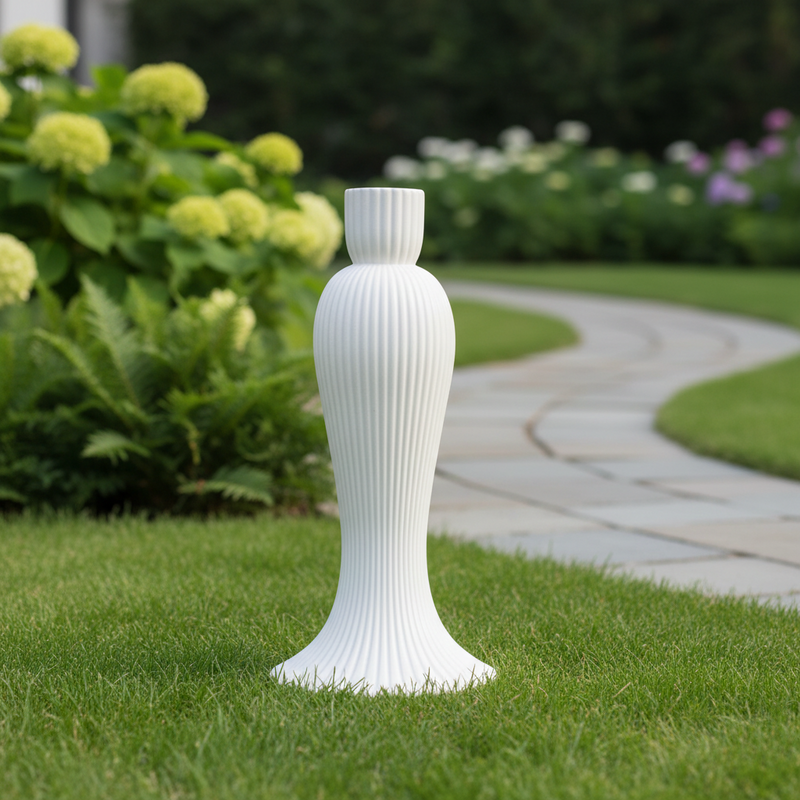 Tall, fluted vase with a classical silhouette and subtle vertical ribbing, inspired by old world European and Renaissance styles. Side Angle