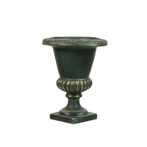 Ornate classical urn planter with fluted base and decorative rim, featuring old world European and Renaissance-inspired detailing.